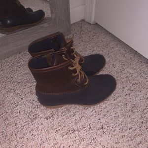 brown and blue sperry boots